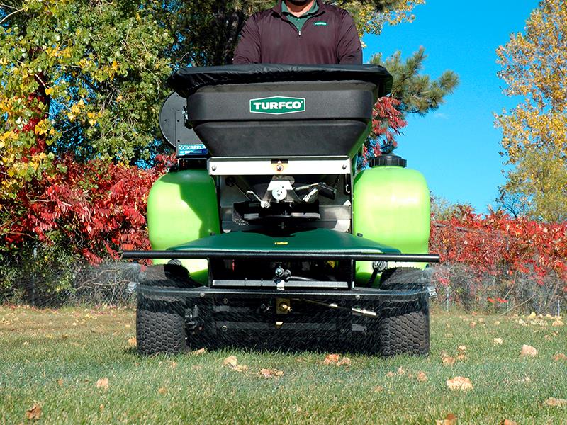 Ride-on spreader and sprayer performing lawn spraying and fertilization on a North Mississippi property